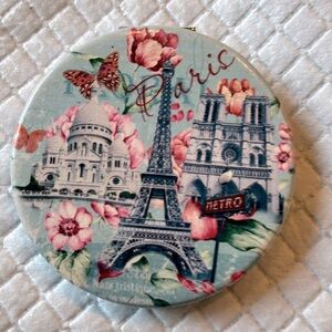 Pocket purse mirror. One regular mirror and one magnifying mirror.